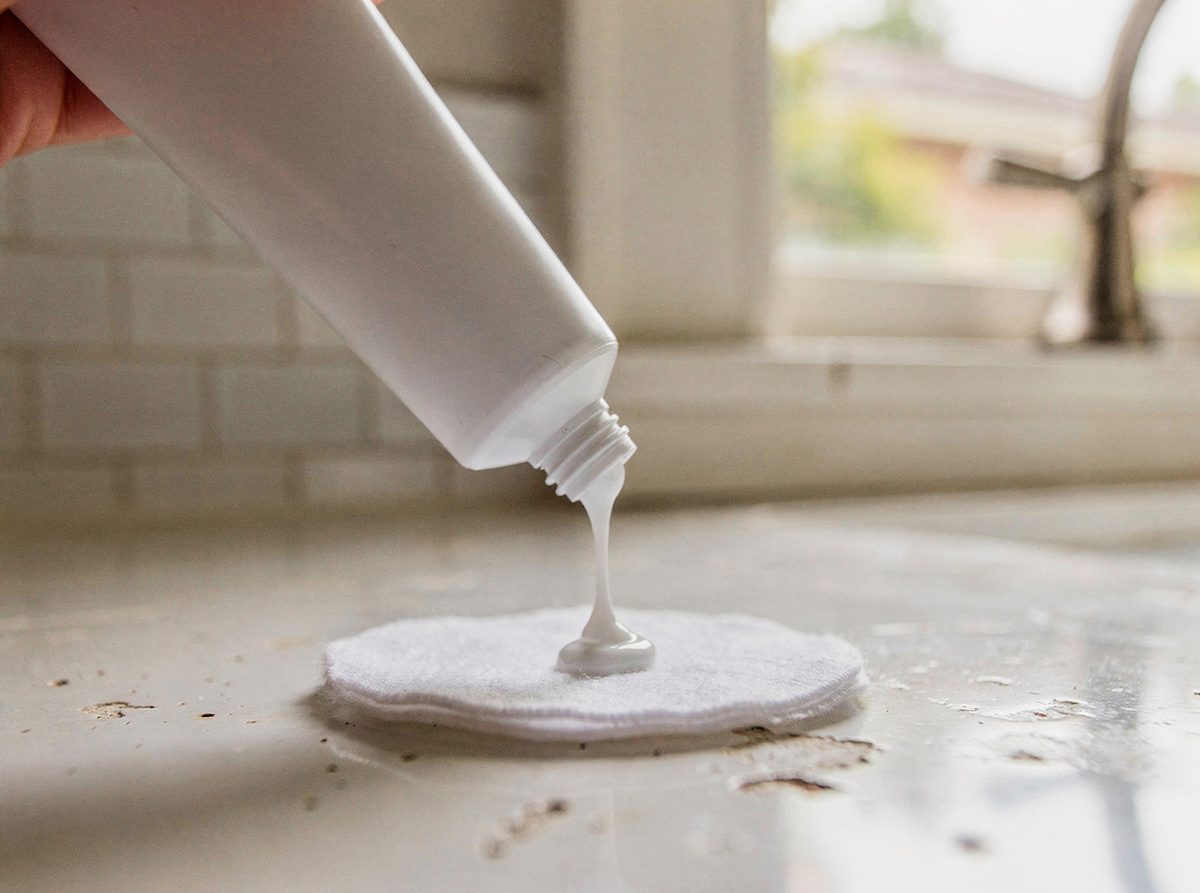 Cream cleanser dispensed onto a cotton pad